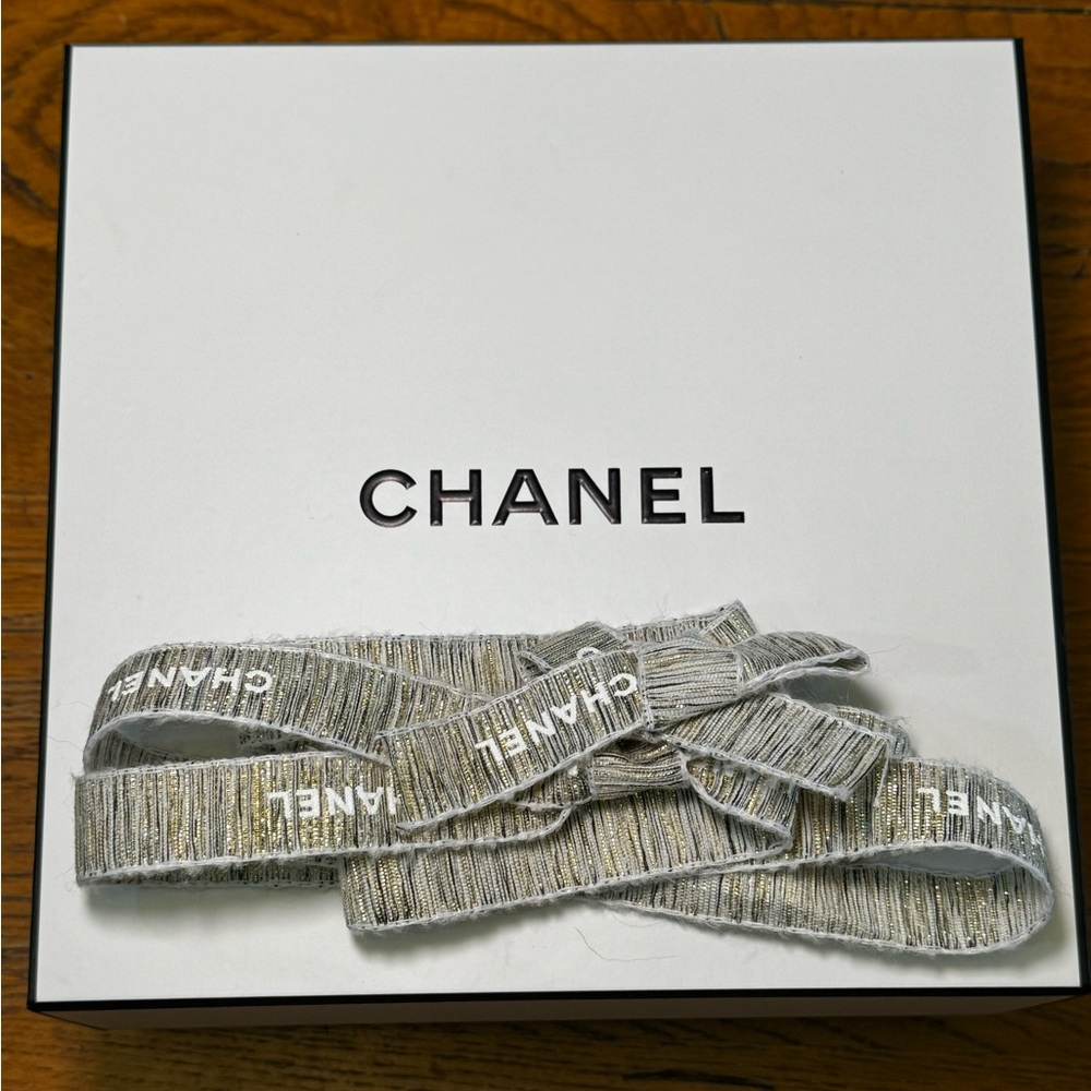 Authentic white and black empty Chanel box with ribbon